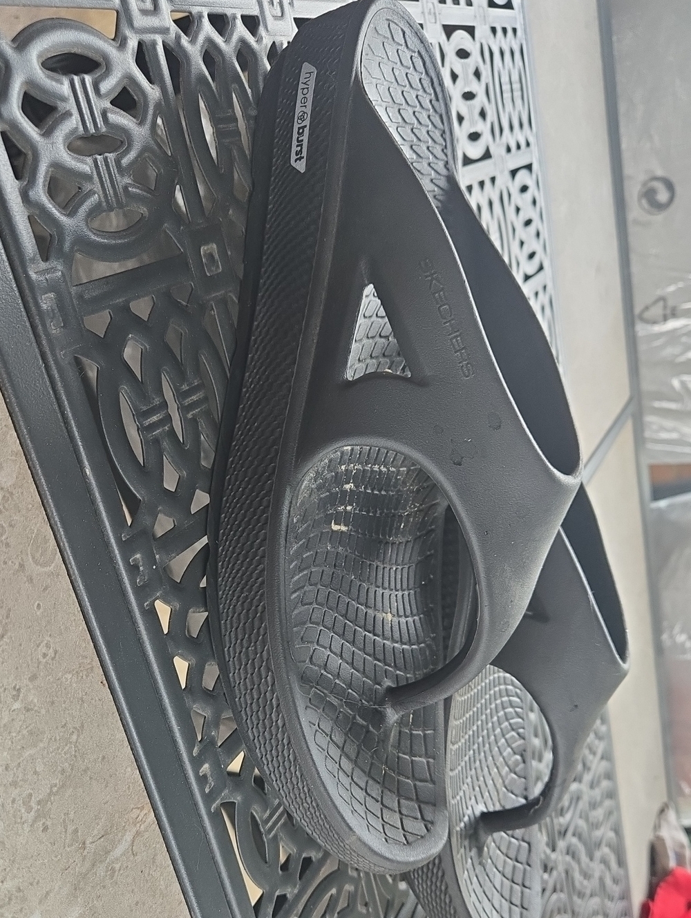 black Skechers GO Recover Refresh sandals featuring thick hyper burst